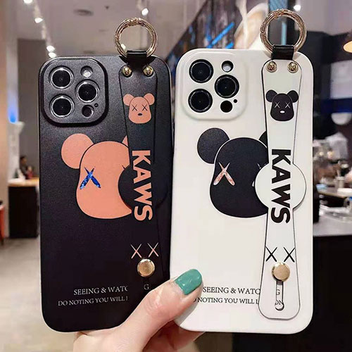 カウズ ブランド iphone12/12 pro/12 pro maxケース ハンドバンド付き 韓国風 ホルダー付 KAWS 個性潮 iphone x/xr/xs/xs maxケース 落下防止 ファッション ins風 iphone 11/11 pro/11 pro maxケース かわいい iphone x/8/7 plusケース大人気