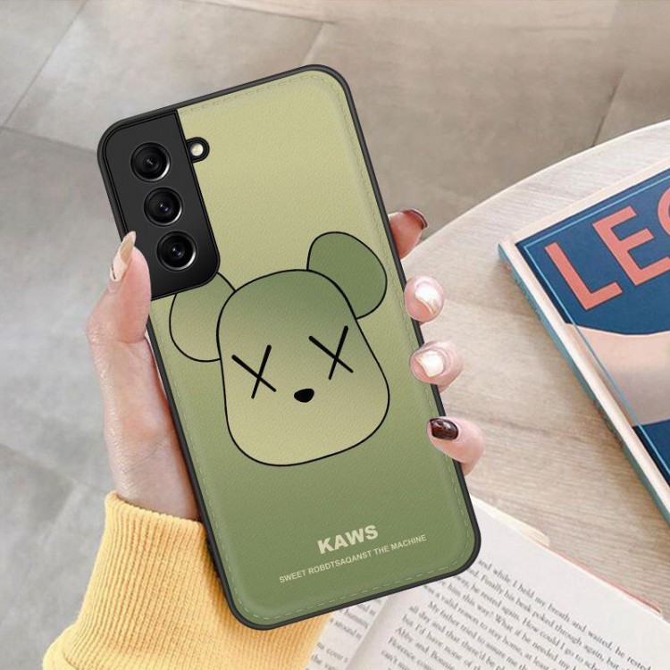 Kaws カウズブランドGalaxy a54 a55 s24ケース薄型iphone 15pro Maxファッションギャラクシーa54 a55 a53 a52ハイブランドスマホケースブランドsumsung a23 a22 a20 a55 a54スマホカバー男女兼用ブランドサムスンa32 a23ケース激安パロディ