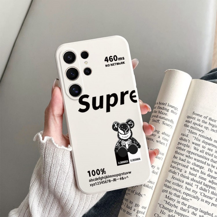 Supreme シュプリーム KAWS カウズ メンズレディースgalaxy s24 ultra/s23 s22ケースファッションブランドgalaxy s23/s24ultra アイホン 13 14 15カバーギャラクシーs23 s24 ultraブランドケース男性愛用galaxy s23/s24ブランドケース女性向け