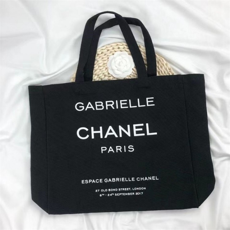 シャネル CHANEL キャンバス トートバッグ ブランド ブラック 手提げバッグ ショッピングバッグ ロゴプリント 大容量 通勤 通学
